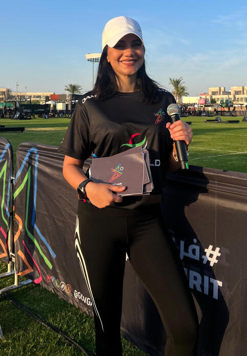 alt="MC Dija hosting Sports event -Gov Games - Dubai Games in Dubai" alt="Bilingual emcee on stage for Huawei corporate event"